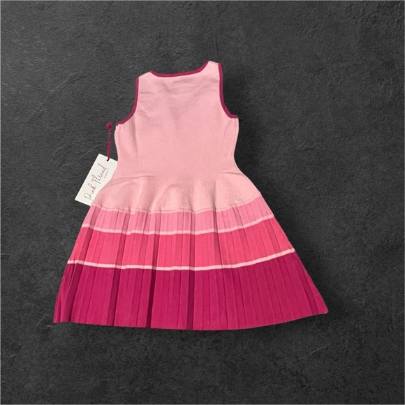 Pink Thread
NWT
Size 4/5
Pink Kids Dress - Picture 2 of 5